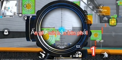 Ấn giữ nút bắn bên phải