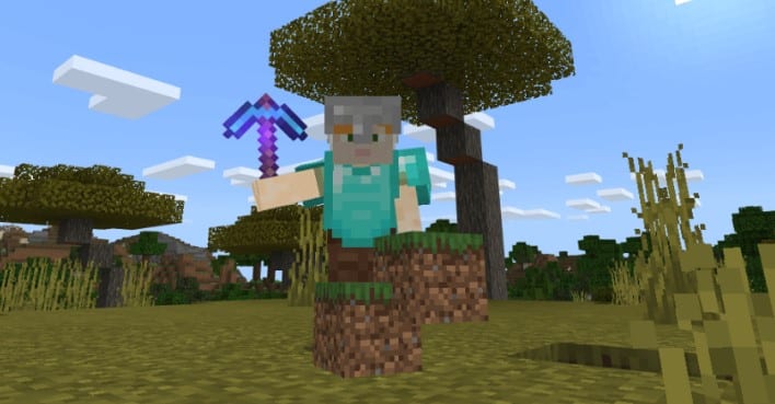 Sử dụng Pickaxe để lấy khối cỏ Minecraft